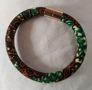 Green Burnt Orange African Ankara Print Fabric magnetic bracelet 1.1. Matching earrings, clutch bag and necklace sold separately. 
