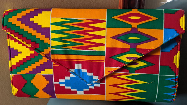 Multi Color African Print Ankara cotton Fabric material Clutch bag. Matching earrings, bracelet and necklace sold separately. 