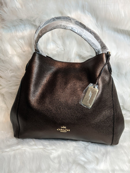 Authentic Coach handbag is 100% genuine leather. 