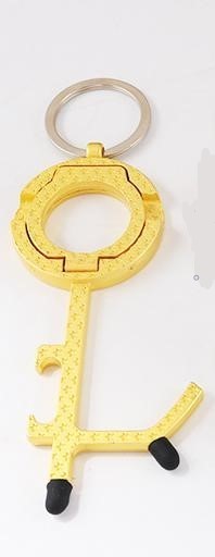 6-in-1 No Touch Multiple Use gold Keychain. Can be used to open doors, bottle opener, cell phone stand, press key pads and elevator buttons, scroll on cell phone and keys holder.