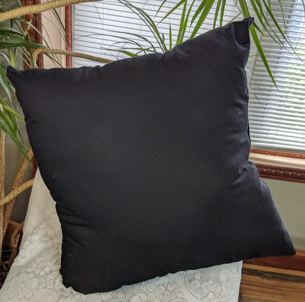 NFL design on one side and plain color on other side, 100% cotton. Measurements: 18 inches long and 18 inches wide