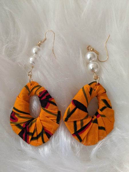 Small size African Ankara fabric pearls earrings for pierced ears. Matching clutch bag sold separately.
