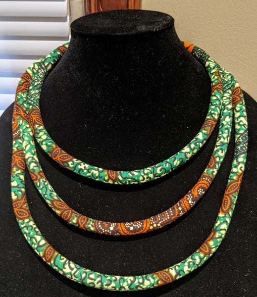 green burnt orange brown African Print Ankara cotton Fabric material magnetic tri-layer necklace. Matching earrings, bracelets and clutch bag sold separately. 