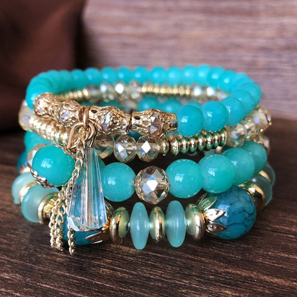 4-piece set Bohemian Heart or Crystal Resin Beads Stone Bracelets. Elastic band fits most wrists.