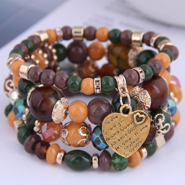 4-piece set Bohemian Heart or Crystal Resin Beads Stone Bracelets. Elastic band fits most wrists.