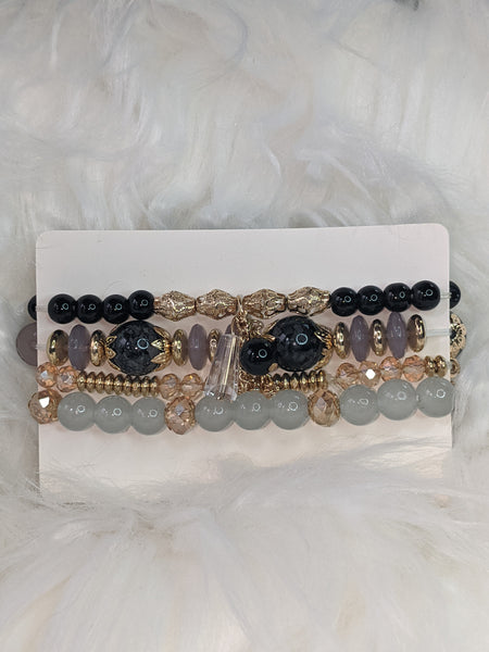 4-piece set Bohemian Heart or Crystal Resin Beads Stone Bracelets. Elastic band fits most wrists.