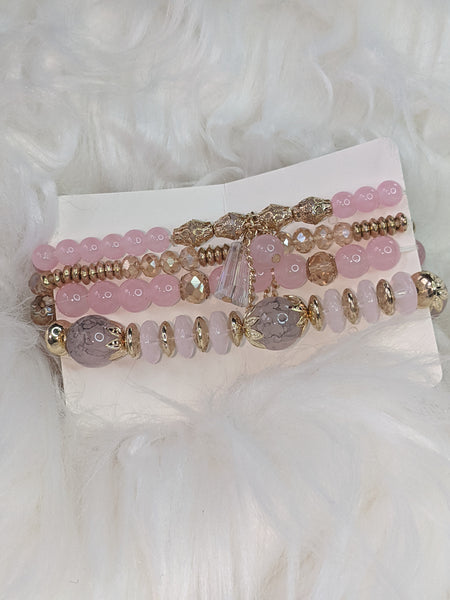 4-piece set Bohemian Heart or Crystal Resin Beads Stone Bracelets. Elastic band fits most wrists.