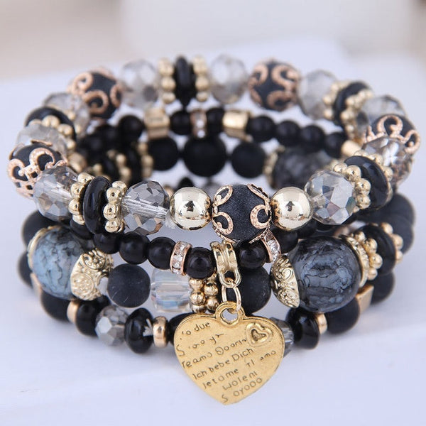 4-piece set Bohemian Heart or Crystal Resin Beads Stone Bracelets. Elastic band fits most wrists.