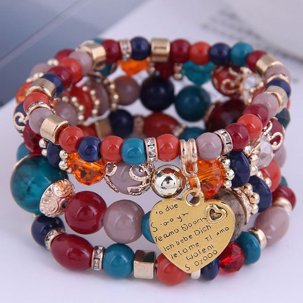 4-piece set Bohemian Heart or Crystal Resin Beads Stone Bracelets. Elastic band fits most wrists.