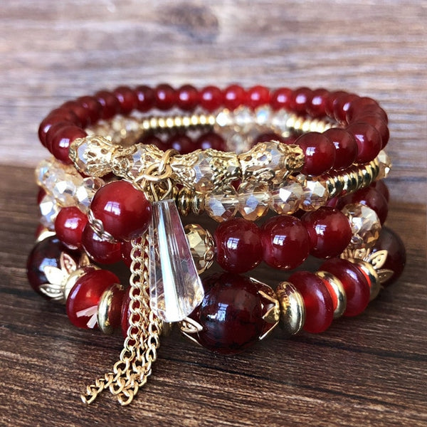 4-piece set Bohemian Heart or Crystal Resin Beads Stone Bracelets. Elastic band fits most wrists.