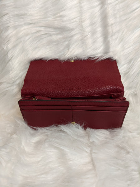 Authentic Michael Kors wallet is (inside) 100% genuine leather