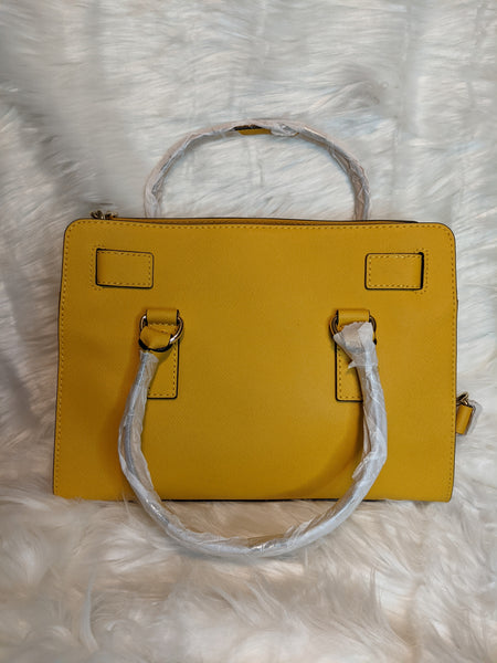 Authentic Michael Kors handbag (back side) is 100% genuine leather. 