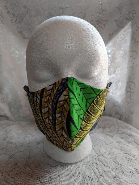 African Ankara cotton fabric face mask. Matching necktie with handkerchief sold separately. tropical green gold yellow blue white