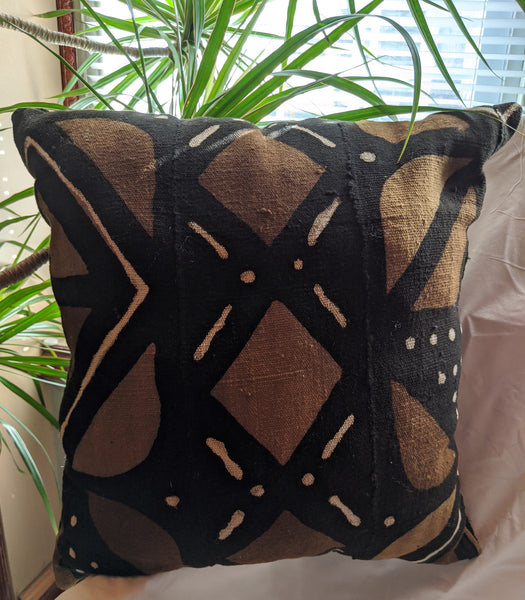 Traditional Authentic Genuine African Mud Cloth Pillow 3. Design one side and other side plain black No two pieces of mud cloth are exactly alike, but the exact patterns vary from one piece to the next brown off white